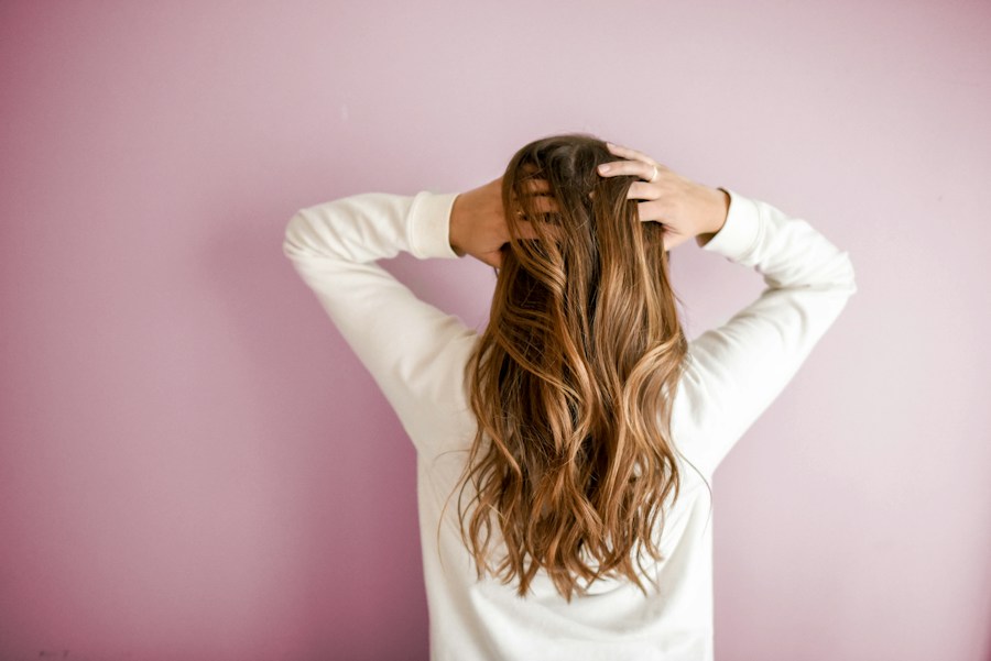 Editorial image of long, softly waved brunette hair